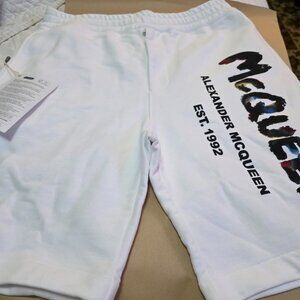 Alexander McQueen Italy Graffiti-print cotton track shorts white brand new